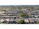 An aerial shot of a residential area highlighting a community park and well-spaced homes at 10322 W Edgemont Dr, Avondale, AZ 85392