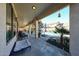 Comfortable covered patio featuring ample space, ideal for outdoor entertaining and relaxation by the pool at 10322 W Edgemont Dr, Avondale, AZ 85392