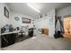 Home office features desk space and storage cabinets, plus closet with hall access to full bathroom at 10322 W Edgemont Dr, Avondale, AZ 85392