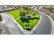 Community park with playground, mature trees, and landscaping at 10322 W Edgemont Dr, Avondale, AZ 85392