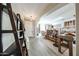 Open room with wood floors and a large shelving unit at 10322 W Edgemont Dr, Avondale, AZ 85392