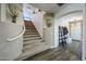 Bright staircase featuring carpeted stairs, modern design, and decor at 10322 W Edgemont Dr, Avondale, AZ 85392