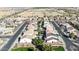 Picturesque street with neatly kept houses, pools, and gardens at 10322 W Edgemont Dr, Avondale, AZ 85392