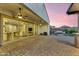 A luxurious backyard with a covered patio and an expansive outdoor living space at 10719 E Simone Ave, Mesa, AZ 85212