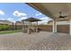Inviting outdoor kitchen area, complete with a built-in BBQ and plenty of counter space at 10719 E Simone Ave, Mesa, AZ 85212