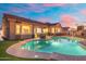 Inviting backyard pool and patio area perfect for outdoor entertaining, surrounded by lush landscaping at 10722 E Keats Ave, Mesa, AZ 85209