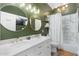 Stylish bathroom featuring double sinks, modern fixtures, and elegant decor at 10722 E Keats Ave, Mesa, AZ 85209