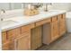 Modern bathroom featuring a vanity with double sinks, elegant quartz countertops, and sleek cabinets at 10722 E Keats Ave, Mesa, AZ 85209
