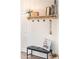 Cozy entryway featuring a bench and decorative accents, enhancing the inviting atmosphere at 10722 E Keats Ave, Mesa, AZ 85209