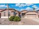 Charming single-story home with well-manicured landscaping and a two-car garage at 10722 E Keats Ave, Mesa, AZ 85209