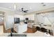 Well-lit kitchen with a center island, stainless steel appliances, and cozy breakfast area at 10722 E Keats Ave, Mesa, AZ 85209
