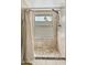 Shower with neutral tile surround and decorative accent tiles at 11420 N 50Th St, Scottsdale, AZ 85254
