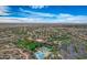 Wide aerial view showcasing the community pool, park, and the surrounding neighborhood at 11554 W Lone Tree Trl, Peoria, AZ 85383