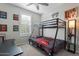Gaming themed bedroom featuring a bunkbed and gamer decor at 11554 W Lone Tree Trl, Peoria, AZ 85383