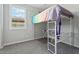Bedroom featuring loft bed and desk with window at 11554 W Lone Tree Trl, Peoria, AZ 85383