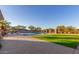 Inviting outdoor pool with lounging chairs, and lush landscaping for a resort-style living at 11554 W Lone Tree Trl, Peoria, AZ 85383