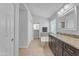 Spacious bathroom with a double sink vanity, soaking tub, and natural light at 16002 N 50Th St, Scottsdale, AZ 85254