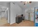 Spacious bedroom with bunk beds, desk, and door leading to the hall at 16002 N 50Th St, Scottsdale, AZ 85254