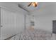 Neutral bedroom with a large closet and a view of the hall and staircase at 16002 N 50Th St, Scottsdale, AZ 85254