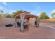 Backyard gazebo with outdoor kitchen setup and ample space for dining and entertaining in a private outdoor oasis at 16002 N 50Th St, Scottsdale, AZ 85254