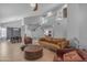 Spacious living room with stairs, dining area, and comfortable seating at 16002 N 50Th St, Scottsdale, AZ 85254
