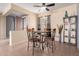Cozy dining area featuring an open layout and views of the front door at 16528 W Isleta Ct, Surprise, AZ 85387