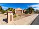 Desert home featuring manicured landscaping and a beautiful mailbox at 16528 W Isleta Ct, Surprise, AZ 85387