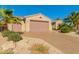 Charming single-story home featuring a two-car garage and desert landscaping at 16528 W Isleta Ct, Surprise, AZ 85387