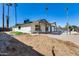 Spacious backyard with pool, covered patio, and potential for gardening or outdoor activities at 1716 W Butler Dr, Phoenix, AZ 85021