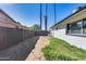 Fenced backyard with dirt for landscaping at 1716 W Butler Dr, Phoenix, AZ 85021