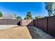Fenced backyard with dirt for landscaping at 1716 W Butler Dr, Phoenix, AZ 85021