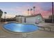 Refreshing backyard pool with diving board perfect for warm days and outdoor entertaining at 1716 W Butler Dr, Phoenix, AZ 85021