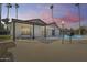Backyard view showcasing the home's covered patio, pool, and outdoor space at 1716 W Butler Dr, Phoenix, AZ 85021