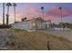 Backyard view showcasing the home's covered patio, pool, and outdoor space at 1716 W Butler Dr, Phoenix, AZ 85021