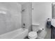 Bathroom featuring a tub, shower, toilet and vanity at 1716 W Butler Dr, Phoenix, AZ 85021