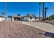 Spacious single-Gathering house with a long driveway, garage, and desert-style landscaping at 1716 W Butler Dr, Phoenix, AZ 85021