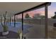 Covered patio area with backyard pool and ample space for outdoor entertaining at 1716 W Butler Dr, Phoenix, AZ 85021