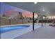 Covered patio view of backyard pool and ample space for outdoor entertaining at 1716 W Butler Dr, Phoenix, AZ 85021