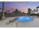 Beautiful backyard pool with diving board, privacy fence and plenty of room to relax and enjoy the backyard at 1716 W Butler Dr, Phoenix, AZ 85021