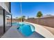 Inviting backyard pool area, featuring an updated pool and plenty of space for outdoor lounging at 1716 W Butler Dr, Phoenix, AZ 85021