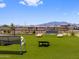 Enjoy the outdoors at this park with a view of distant mountains and recreational areas for everyone at 17683 W Odeum Ln, Goodyear, AZ 85338