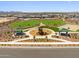 Spacious community park offering playgrounds, picnic areas, volleyball, and green spaces at 17683 W Odeum Ln, Goodyear, AZ 85338