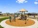 Community playground area with modern play structures and safety features for enjoyment at 17683 W Odeum Ln, Goodyear, AZ 85338