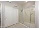 Bathroom with large shower, tile floors, and ample closet space at 19824 N Valencia Ct, Surprise, AZ 85374