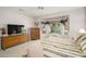 Spacious bedroom with a bay window, comfortable seating, and lots of natural light at 19824 N Valencia Ct, Surprise, AZ 85374