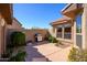 Private backyard patio area with barbecue, desert landscaping, and neutral paint at 19824 N Valencia Ct, Surprise, AZ 85374