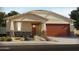 Charming one-story home with desert landscaping and a two-car garage at 20346 N 225Th Dr, Surprise, AZ 85387