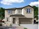 Charming two-story home with neutral tones and landscaped front yard at 2087 E Bucking Bronco Dr, San Tan Valley, AZ 85140