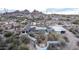 Expansive estate with lush landscaping, desert scenery, and stunning mountain views at 2107 N Campo Allegre Dr, Tempe, AZ 85288
