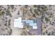 An aerial shot of a large property complete with pool, desert landscape, and solar panels at 2107 N Campo Allegre Dr, Tempe, AZ 85288